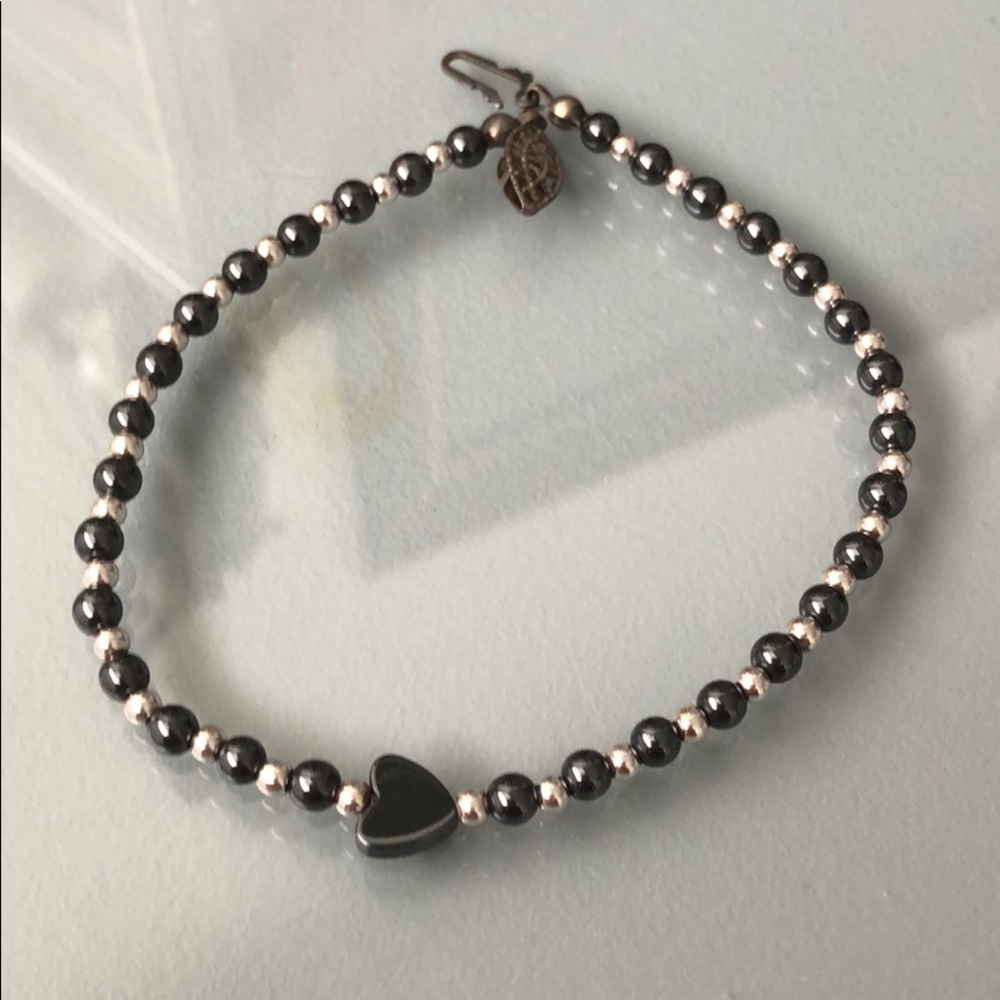 9.5 inch anklet with heart detail.